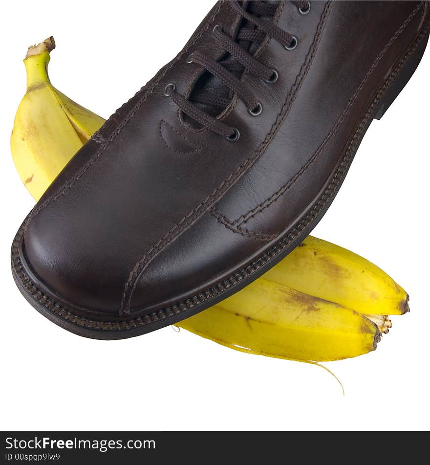 Shoe on banana peel, isolated on white, clipping path included. Shoe on banana peel, isolated on white, clipping path included.