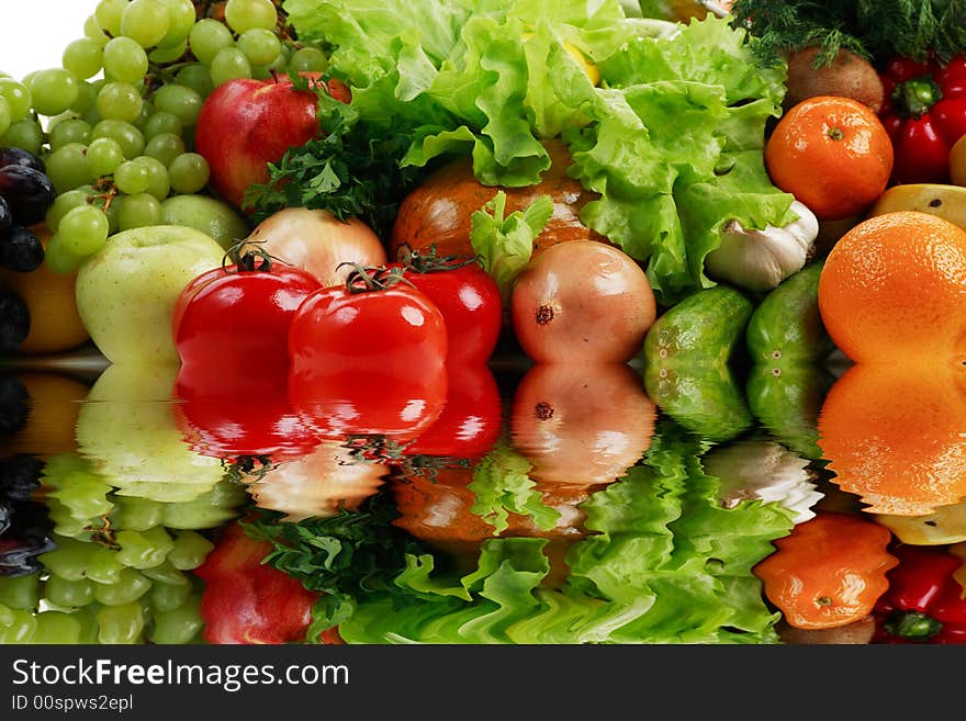 Fresh Vegetables, Fruits and other foodstuffs. Shot in a studio. Fresh Vegetables, Fruits and other foodstuffs. Shot in a studio.