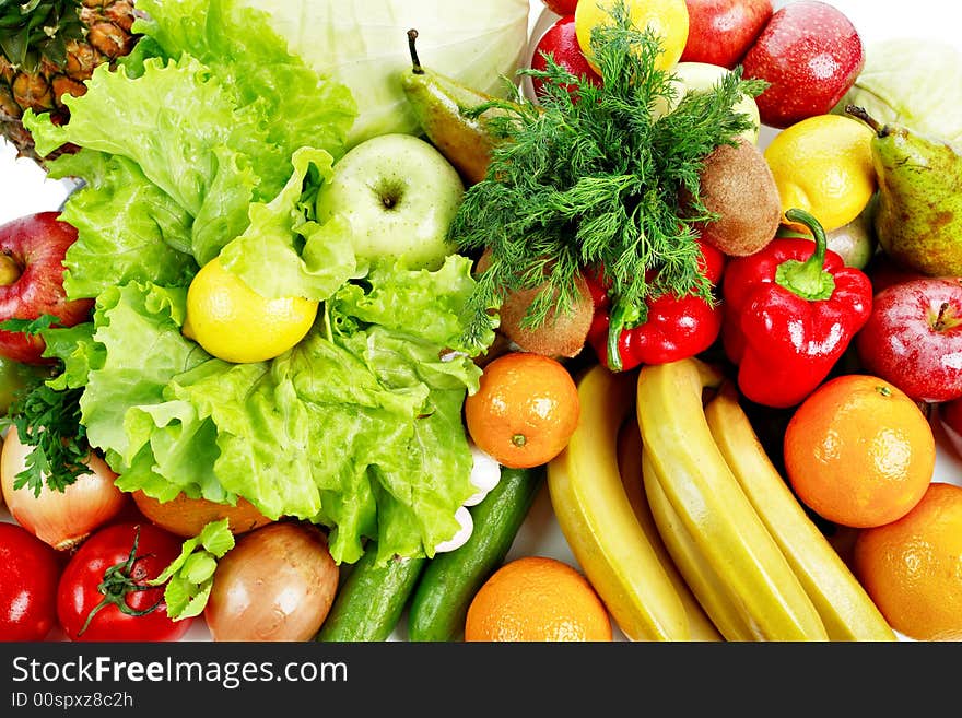 Fresh Vegetables, Fruits and other foodstuffs. Shot in a studio. Fresh Vegetables, Fruits and other foodstuffs. Shot in a studio.