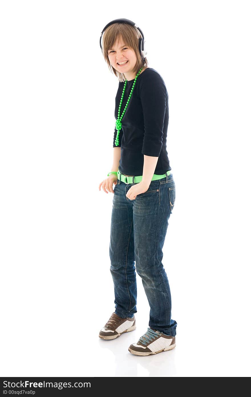 The young girl with a headphones isolated on a white background