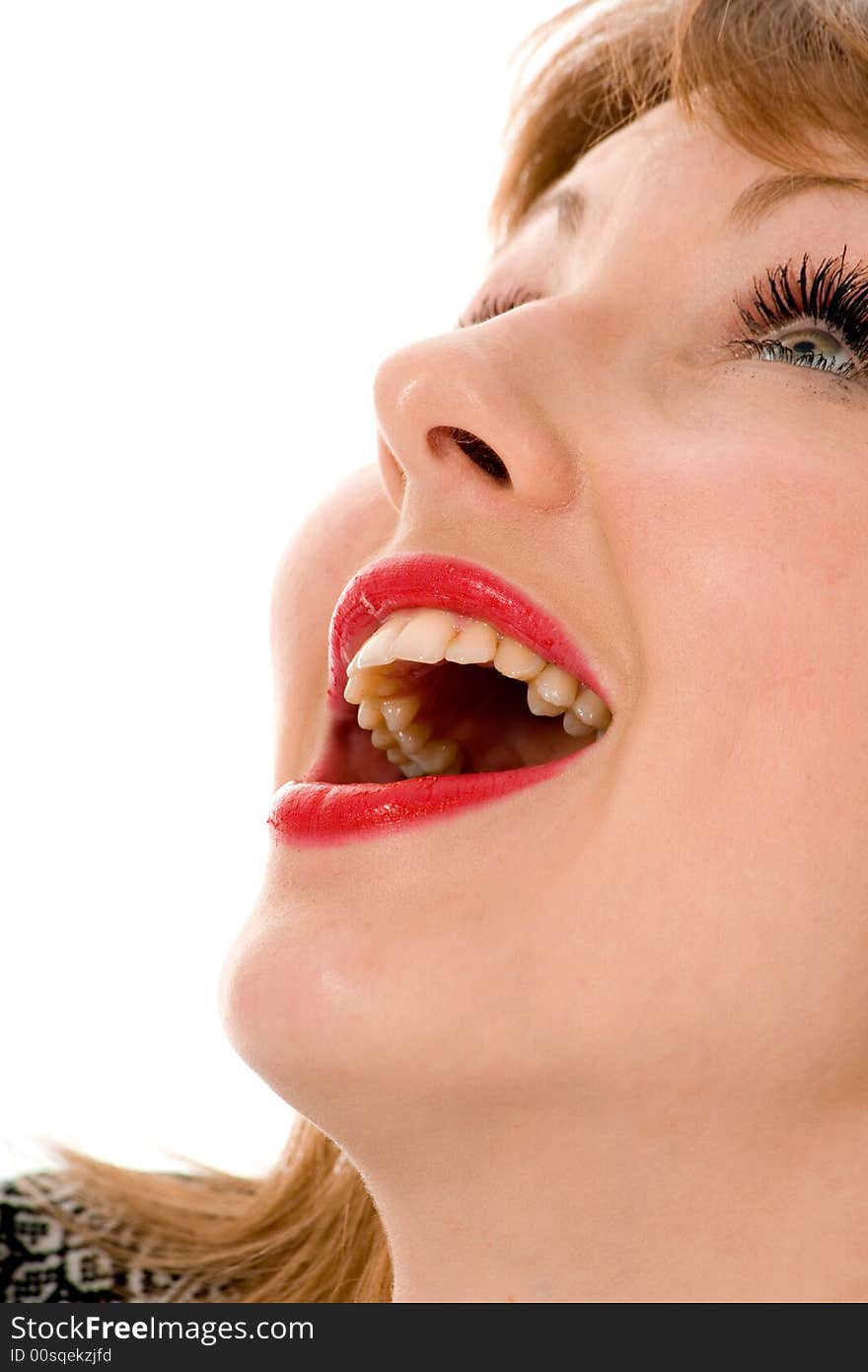 Smile of a beautiful young woman on white background