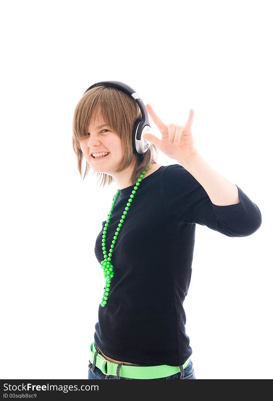 The young girl with a headphones isolated on a white background