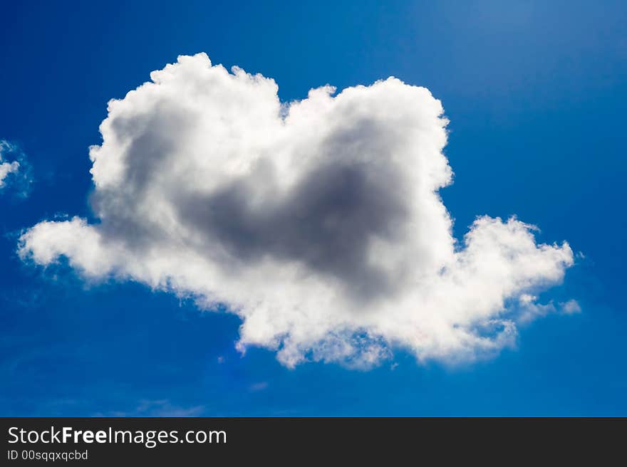 One cloud on a blue sky.