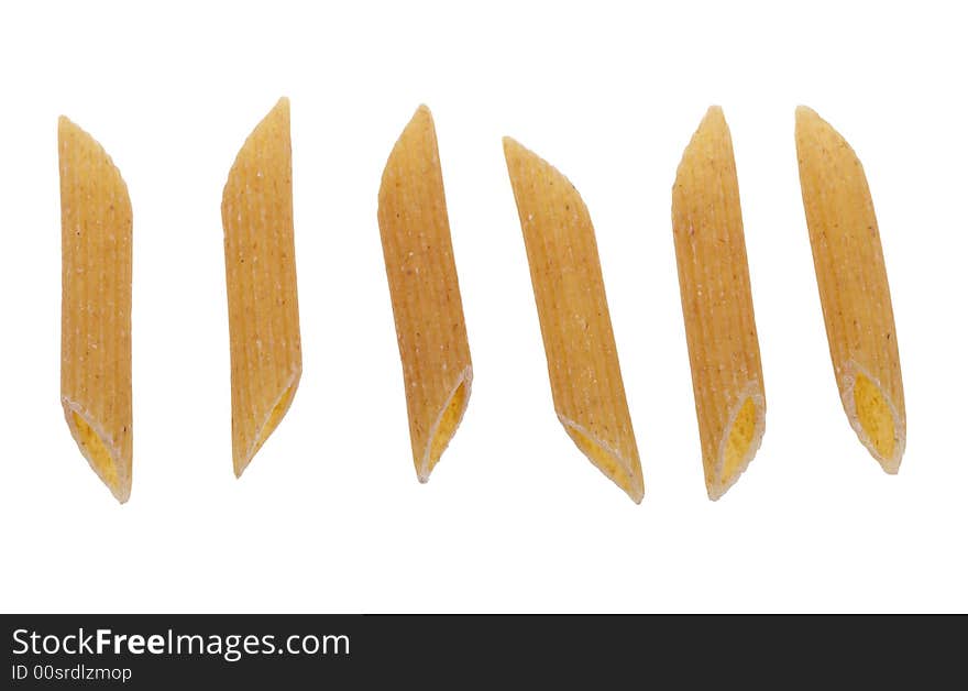 Whole wheat penne rigate pasta isolated on a white background. Whole wheat penne rigate pasta isolated on a white background