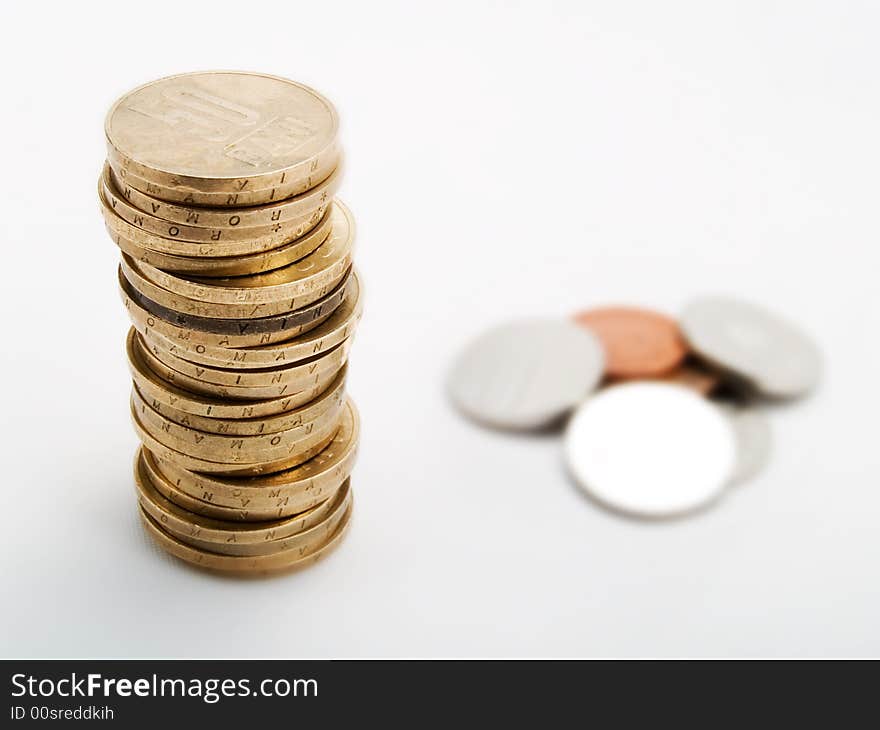 Pile of coins on a white background. Pile of coins on a white background