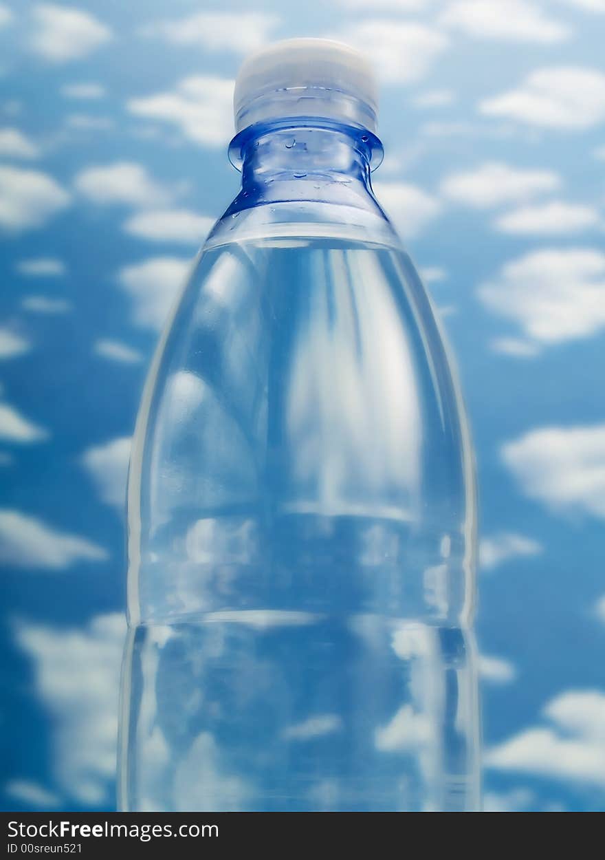 Bottle of water on a blue sky