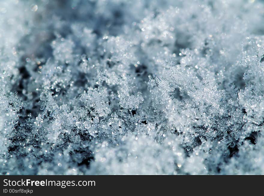 Blue snowflake macro, winter background. Blue snowflake macro, winter background