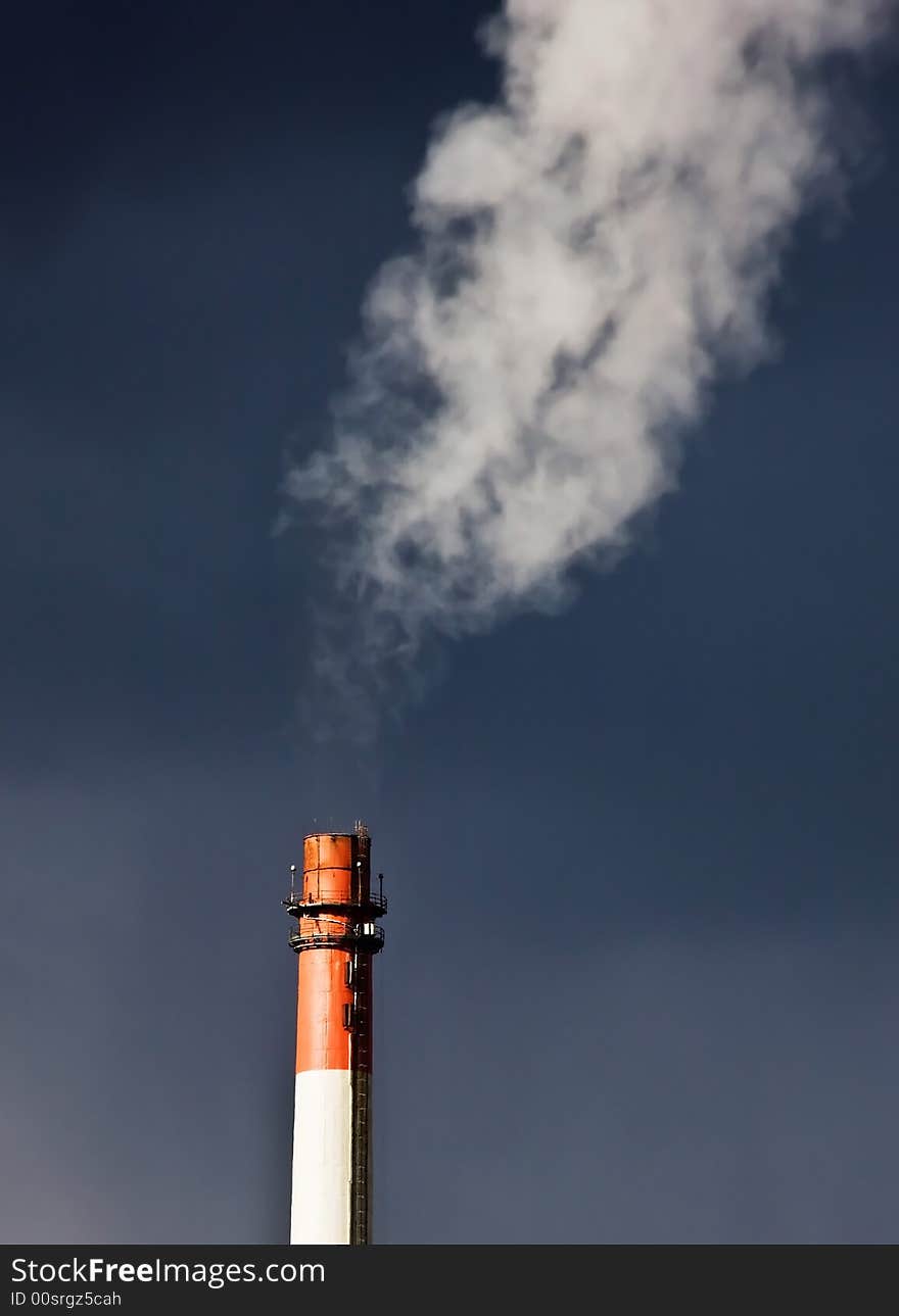 Thick smoke coming out of factory chimney