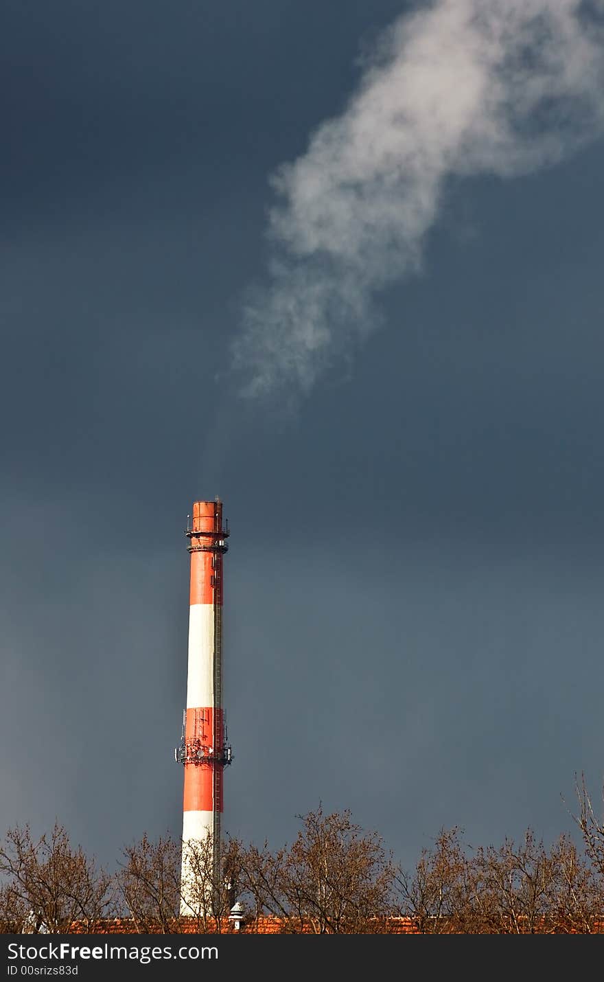 Thick smoke coming out of factory chimney