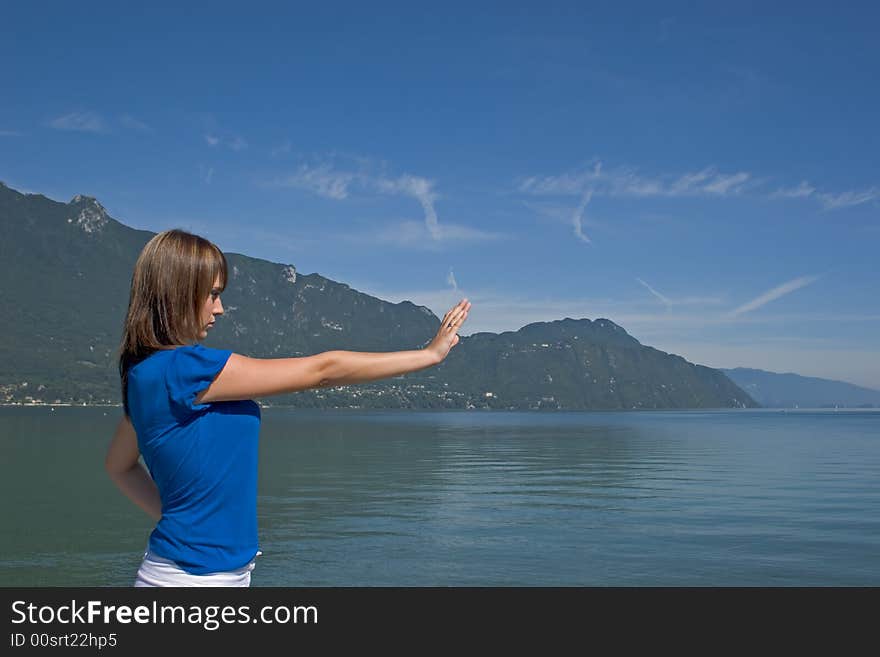 Portrait of a young woman making a sign stop. Portrait of a young woman making a sign stop