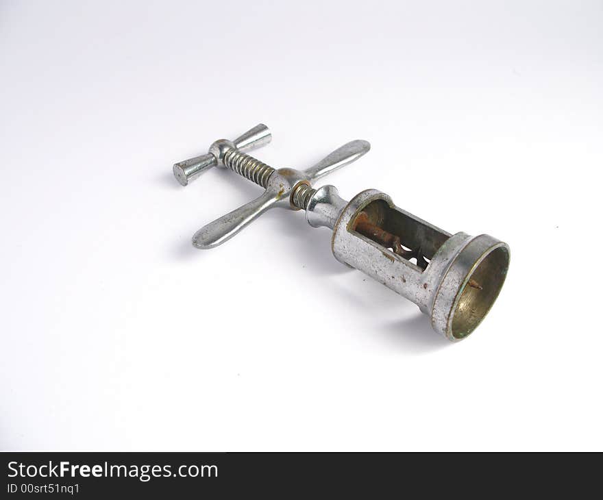 Isolated retro rusty corkscrew on white background