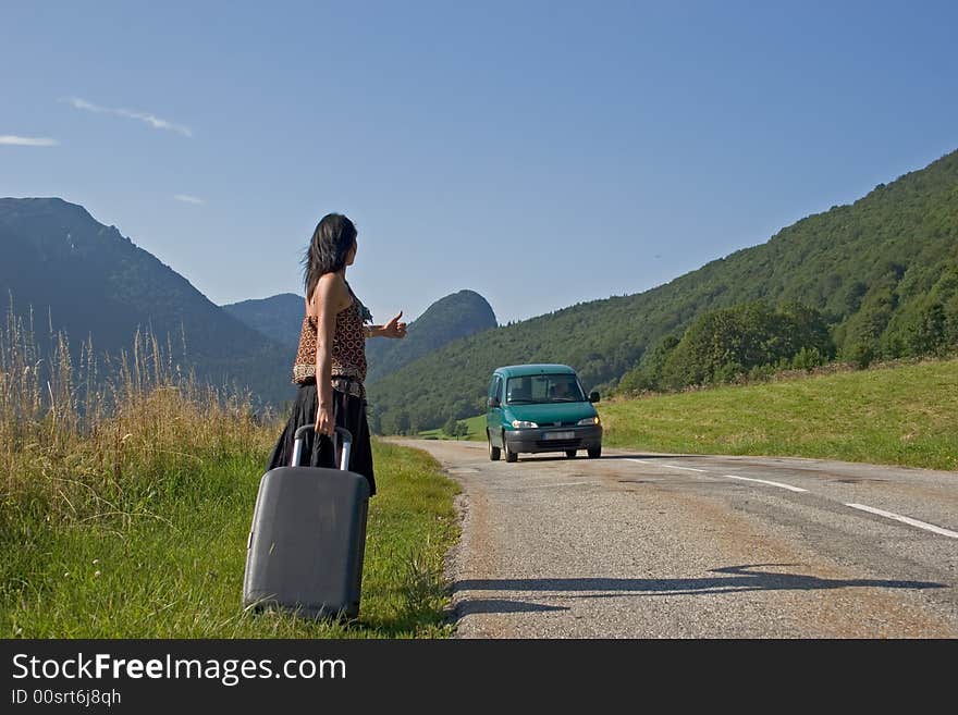 Woman making of hitch-hiking