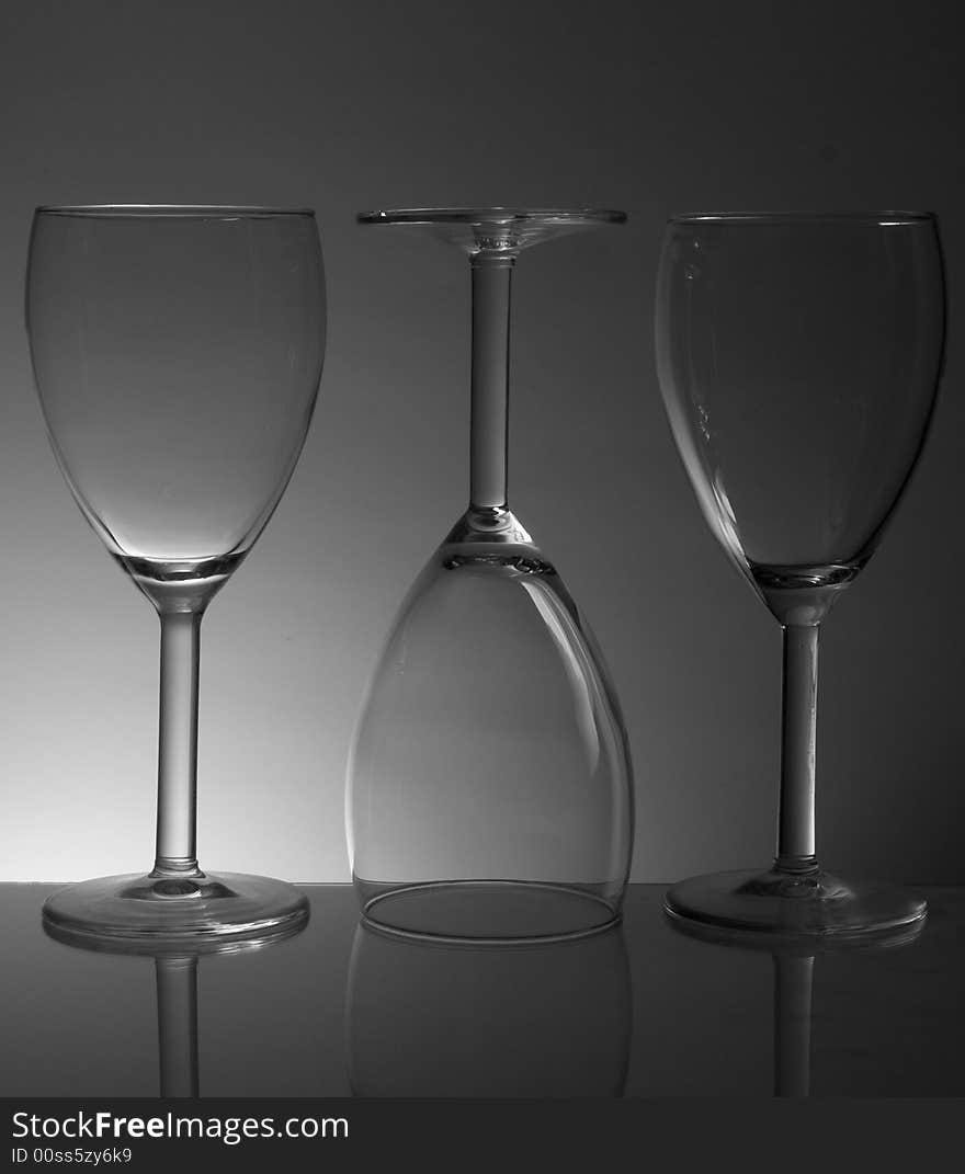 Monochrome Picture Of 3 Full Wine Glasses