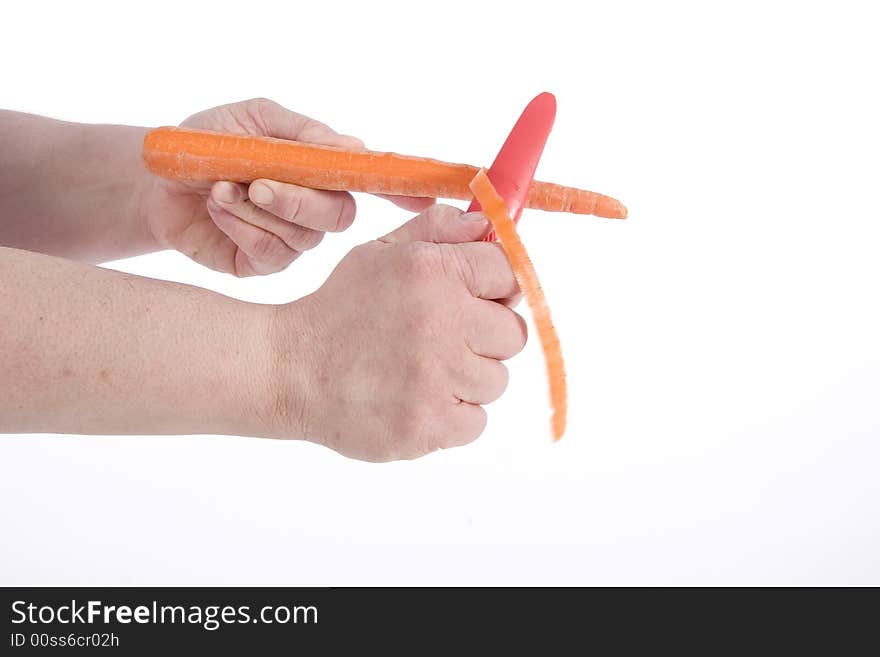 Hand that looks behind a carrot