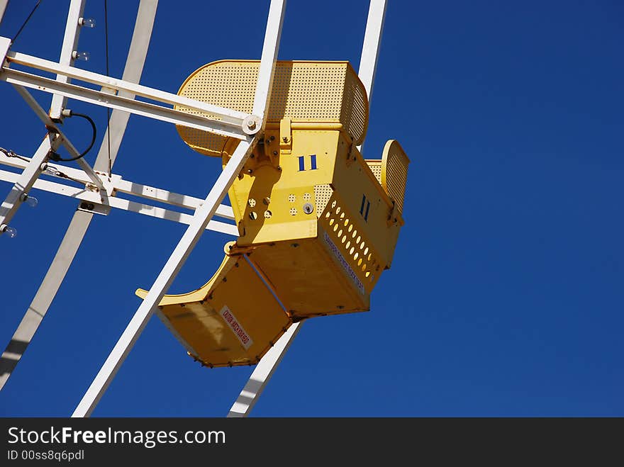 Closeup of chair eleven on a large ferris wheel at the boardwalk