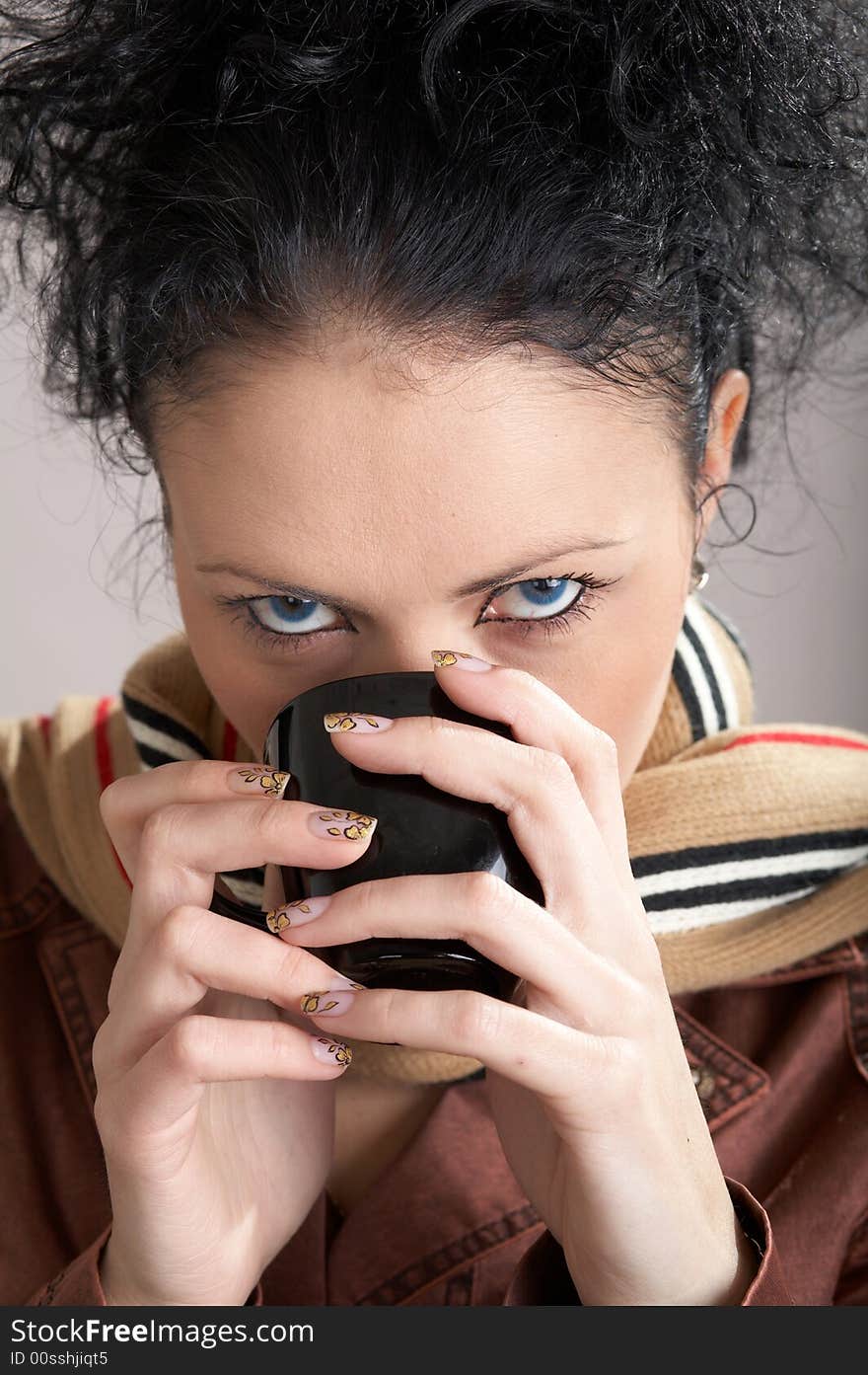 Girl drinking hot tea