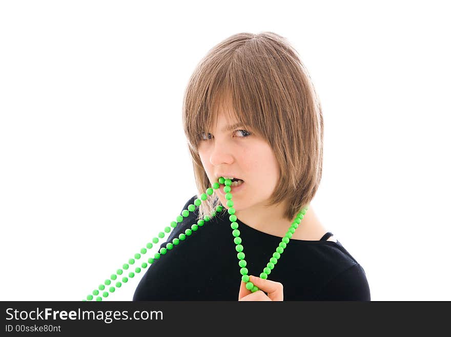 The young beautiful girl with a beads isolated on a white background