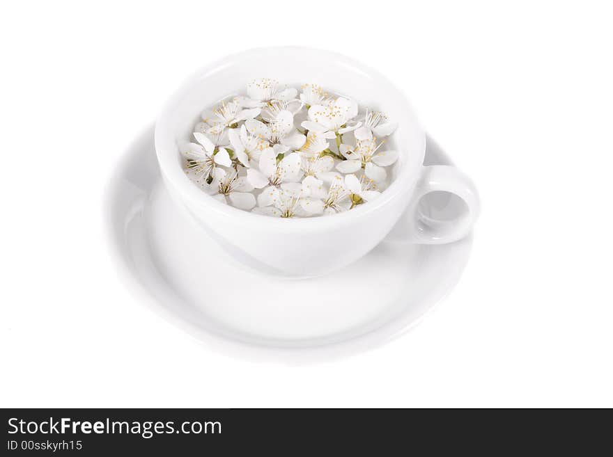 Apple flower on coffee cop on white background. Apple flower on coffee cop on white background