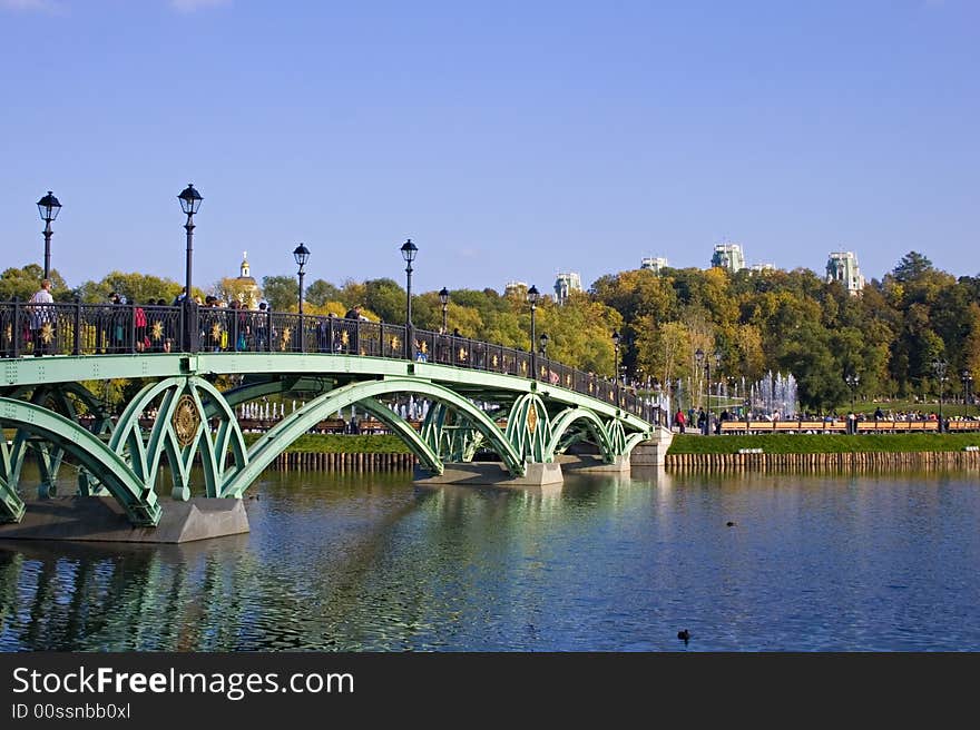 The bridge in autumn park. The bridge in autumn park.