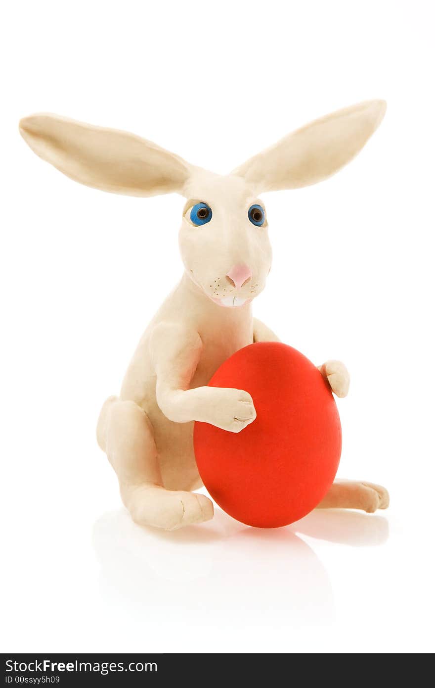 Easter rabbit with red egg