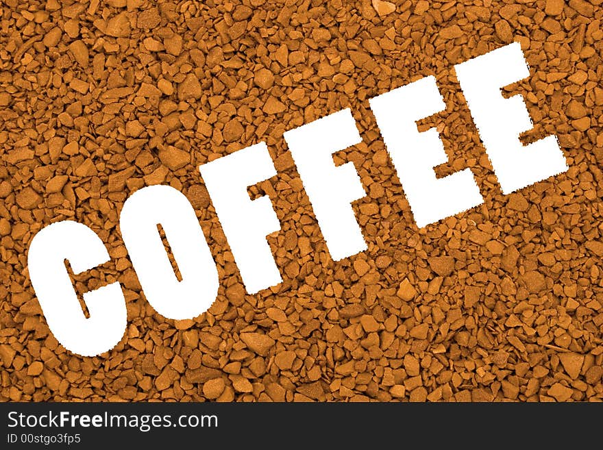 Word Coffee on brown granular background