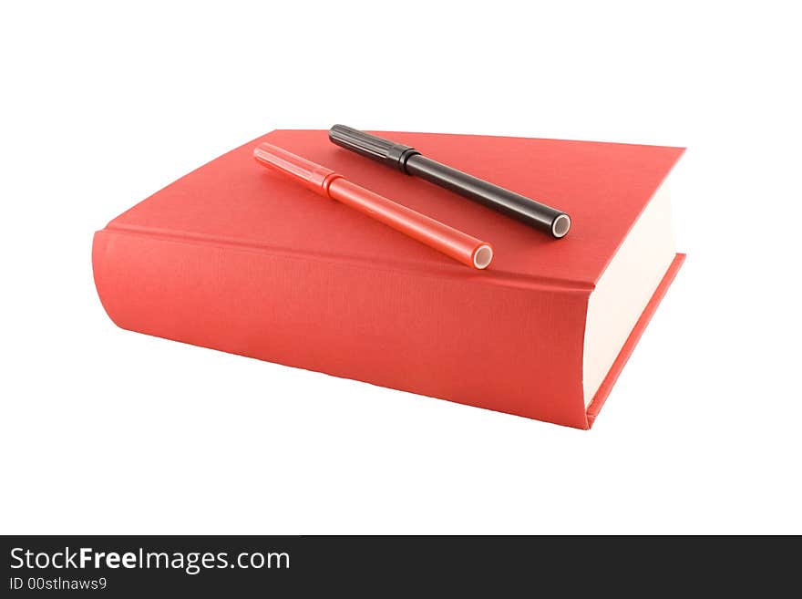 Red book and markers isolated on a white background