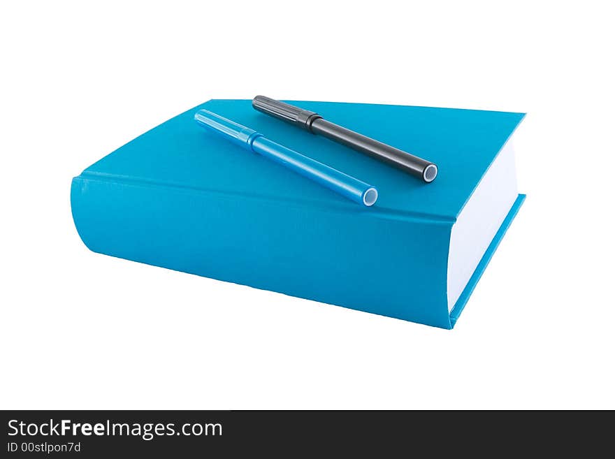 Blue book and markers isolated on a white background. Blue book and markers isolated on a white background