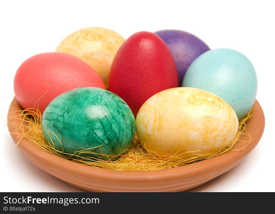 Easter colored eggs on a plate. Easter colored eggs on a plate.