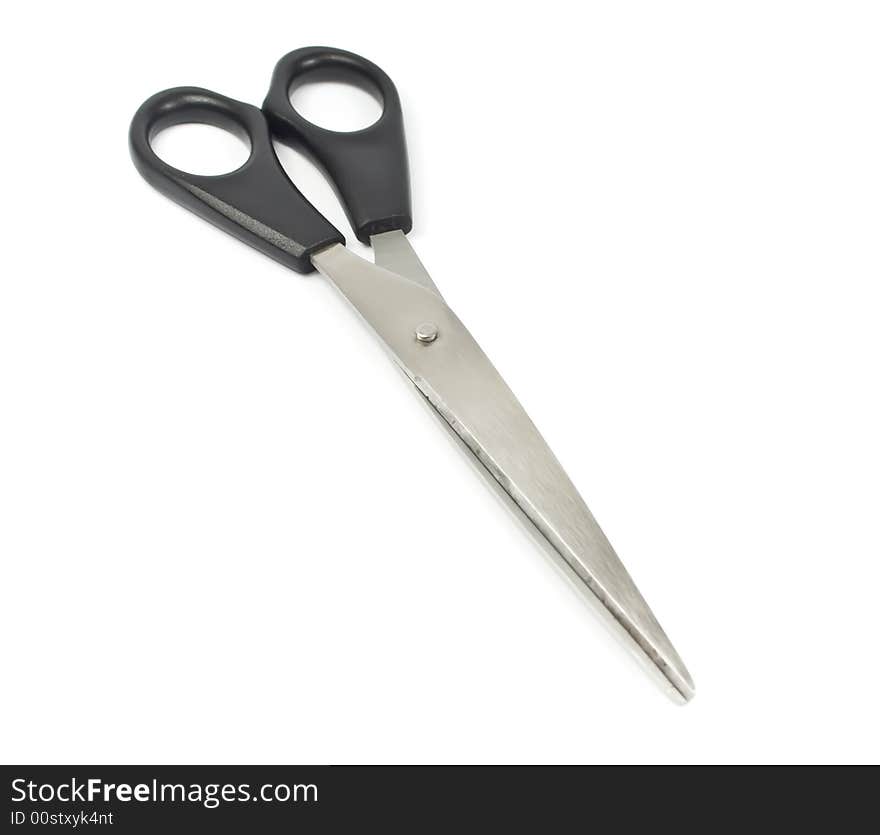 Black scissors isolated one white background