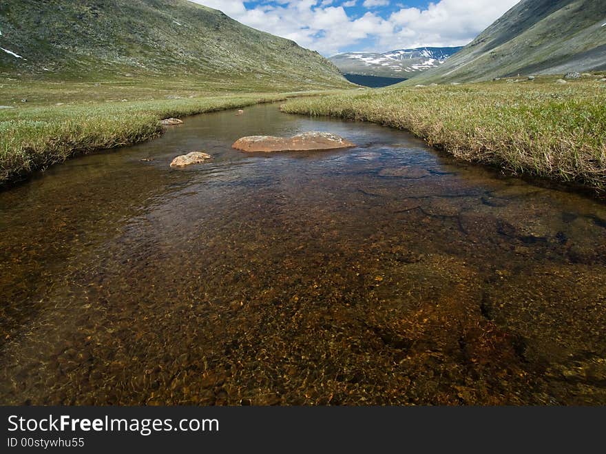 Wide angle photo of a mountain stream. Wide angle photo of a mountain stream