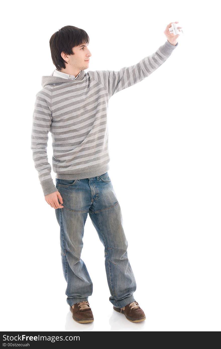 The young guy with the camera isolated on a white background