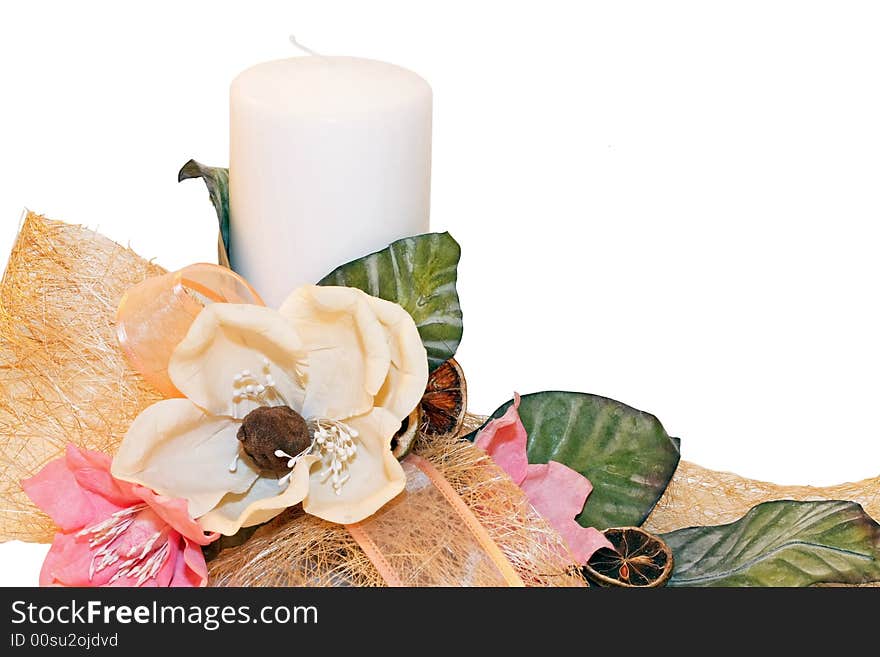 Candle and floral decoration isolated on white. Candle and floral decoration isolated on white