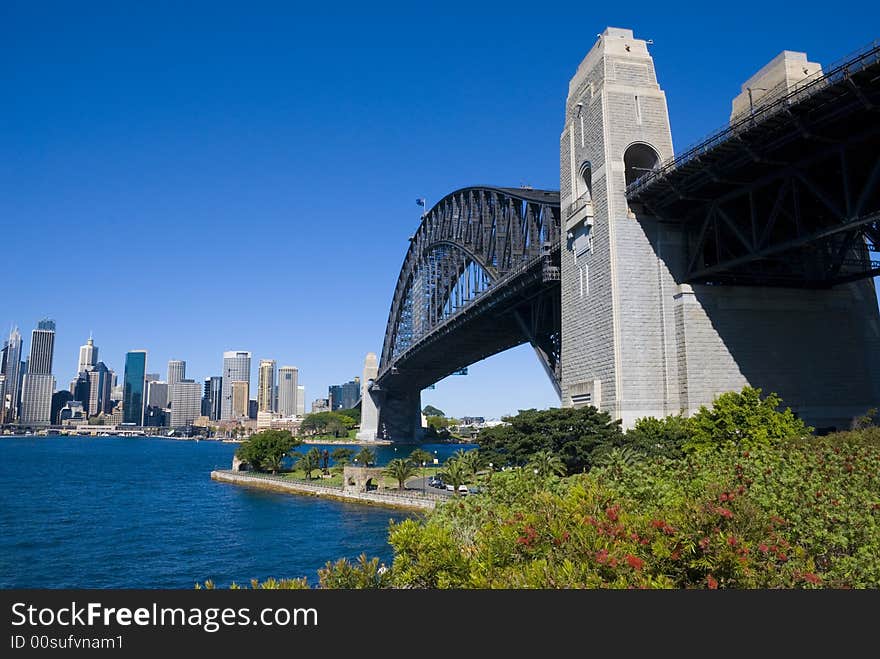 Sydney Harbour (harbor) Bridge and City on a perfect day with clear blue sky. Sydney Harbour (harbor) Bridge and City on a perfect day with clear blue sky