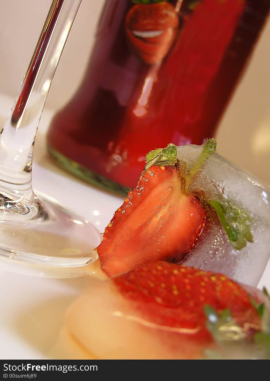 Strawberry in an ice for a cocktail