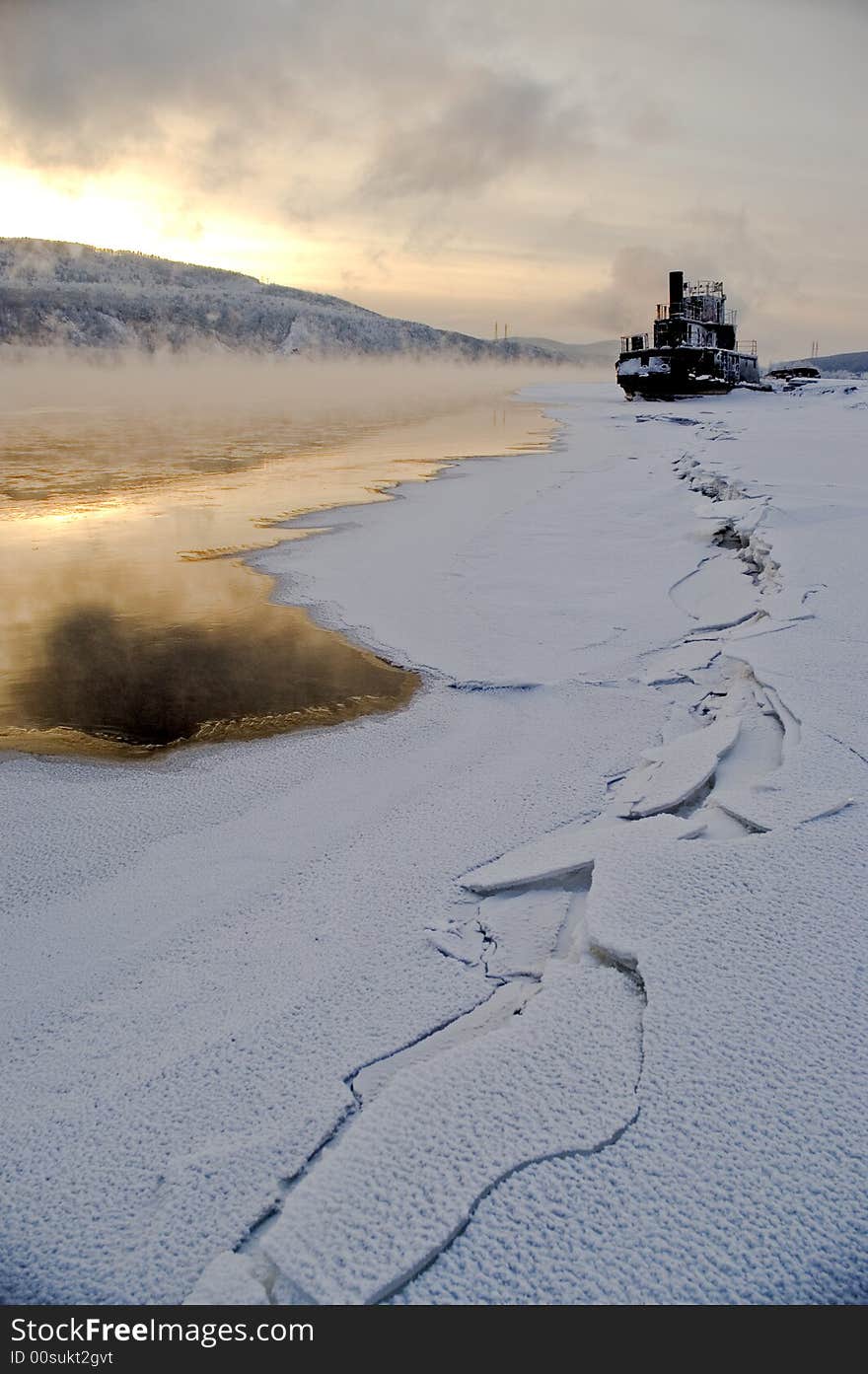 The river. A winter landscape. Ice, water. A river coast. The river. A winter landscape. Ice, water. A river coast.