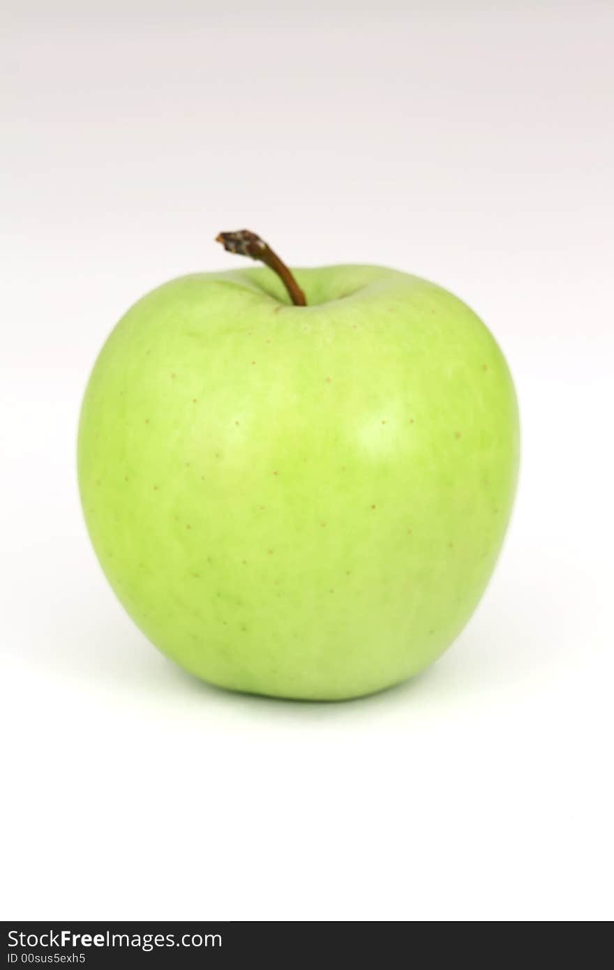 Green apple on a white background