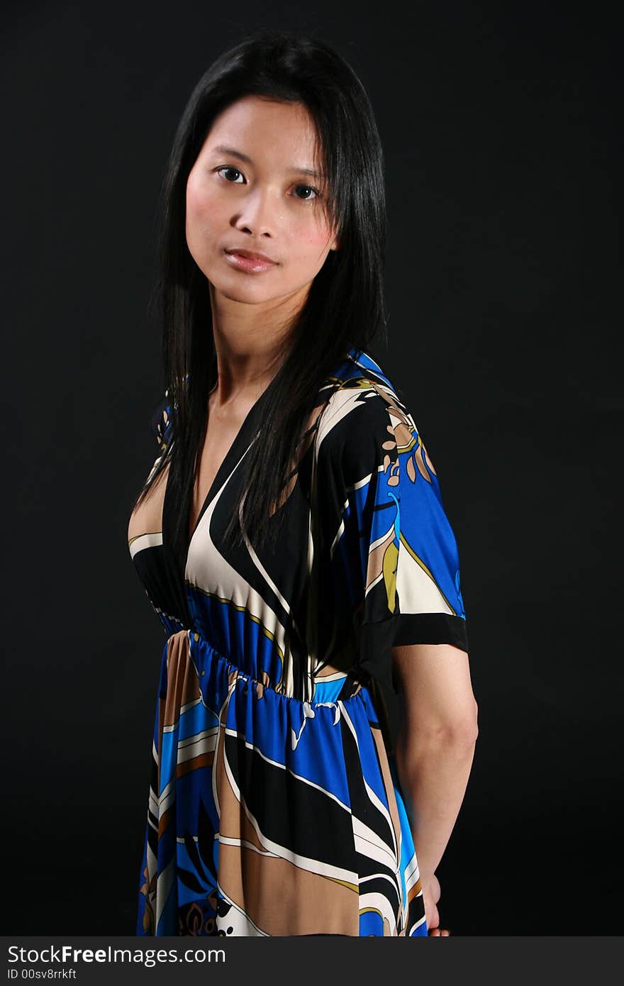 Portrait of young Asian beauty wearing a patterend blouse. Portrait of young Asian beauty wearing a patterend blouse