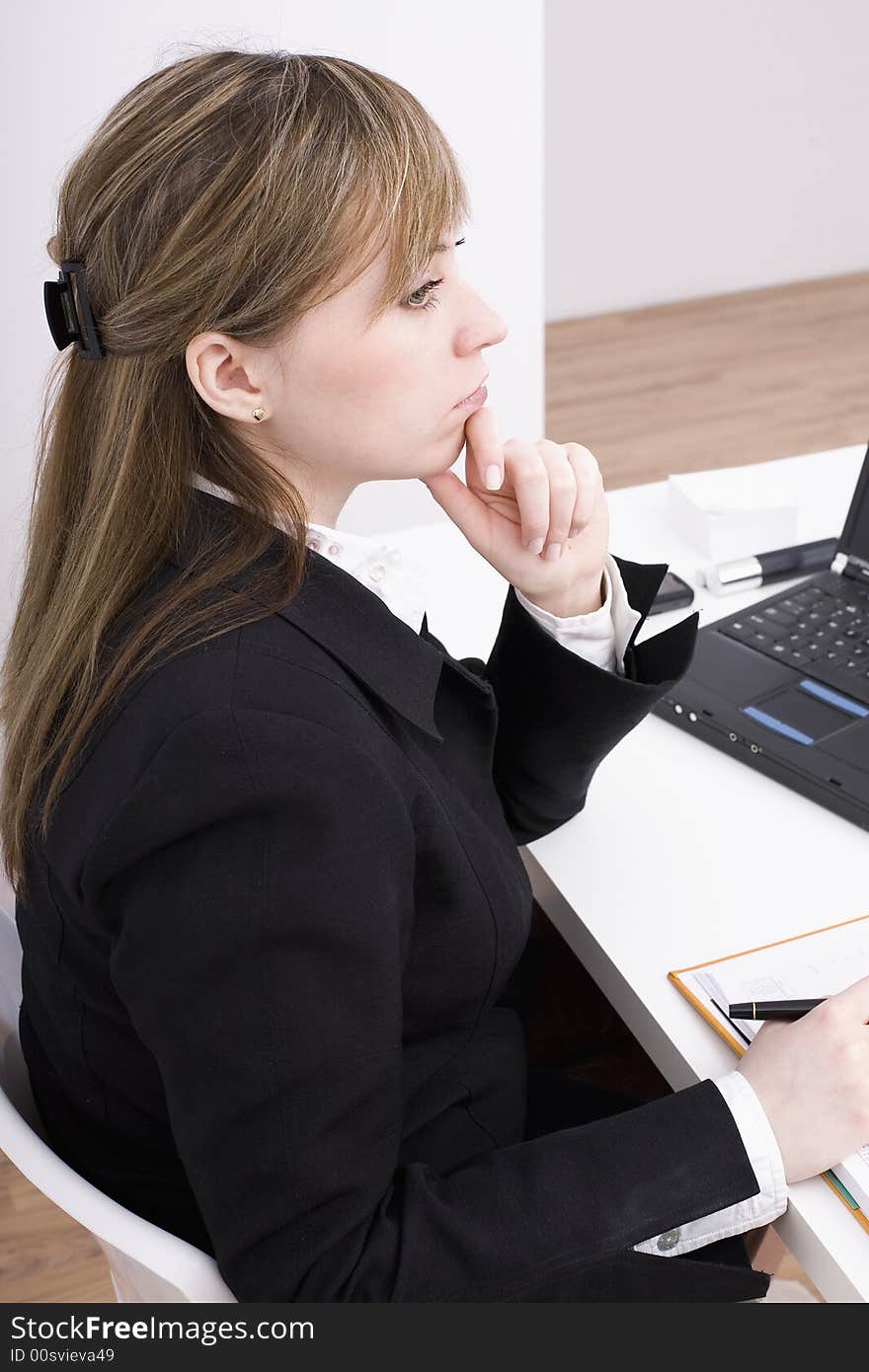 Woman working on the laptop