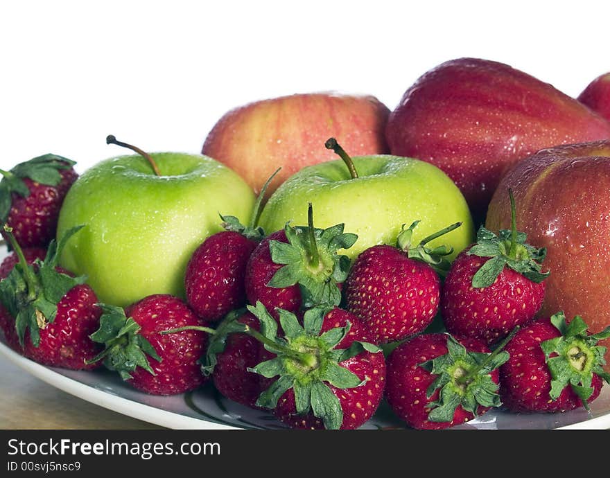 A plate of fruits with white background