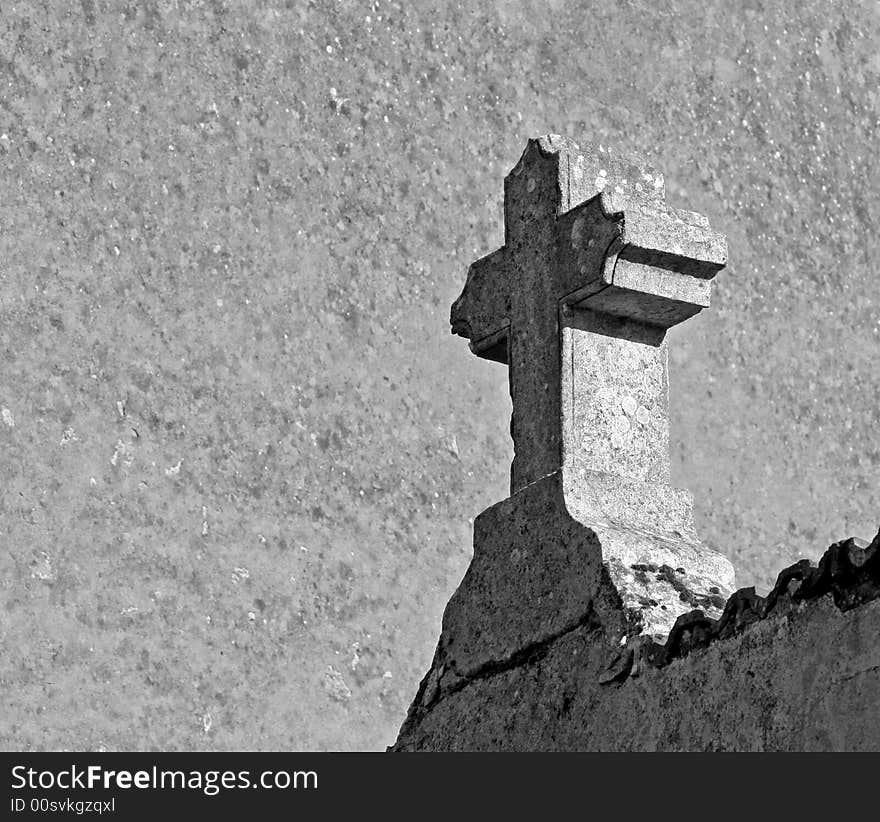 Stone cross in France in black and white