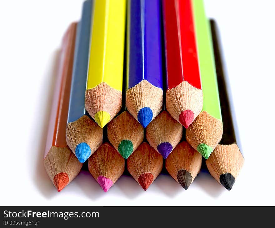 Colors over white in stacked pencil composition. Colors over white in stacked pencil composition