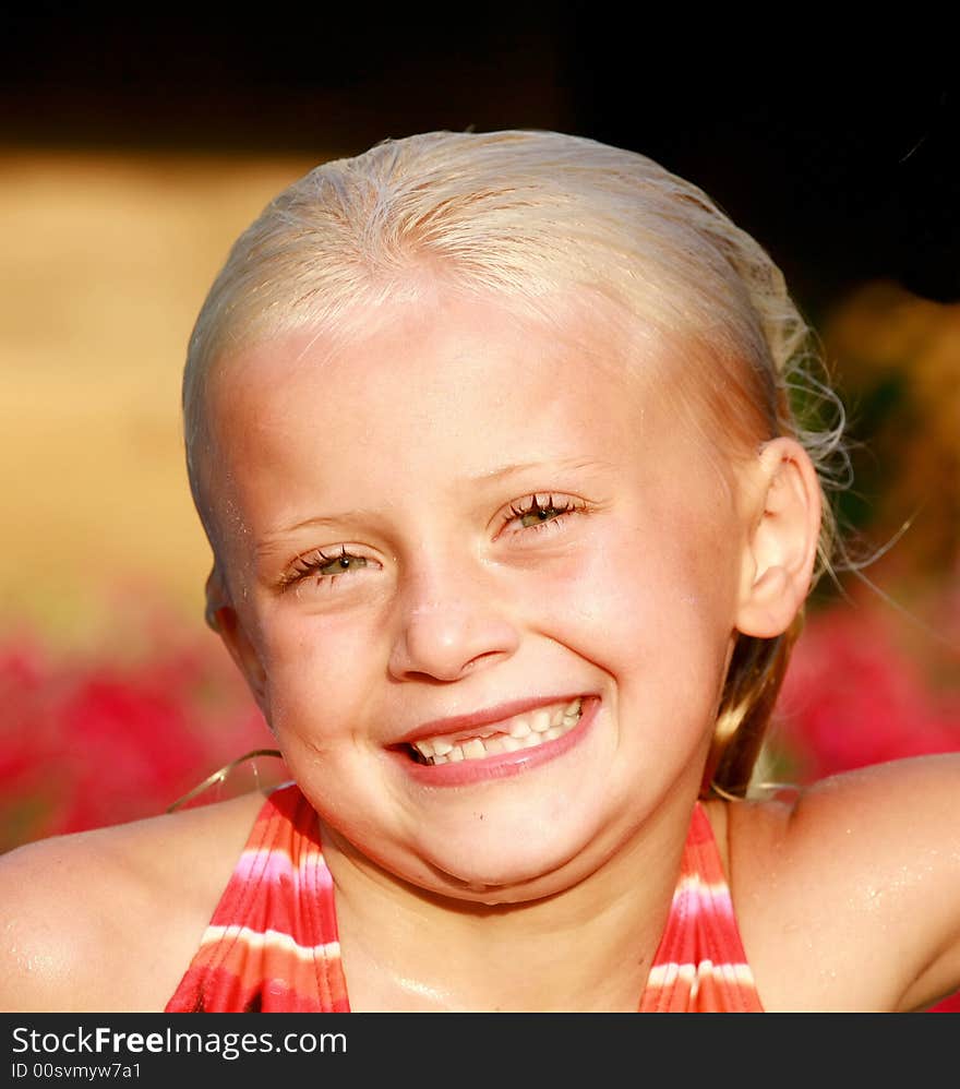 Little Girl Smiling After Swimming in the Summer. Little Girl Smiling After Swimming in the Summer