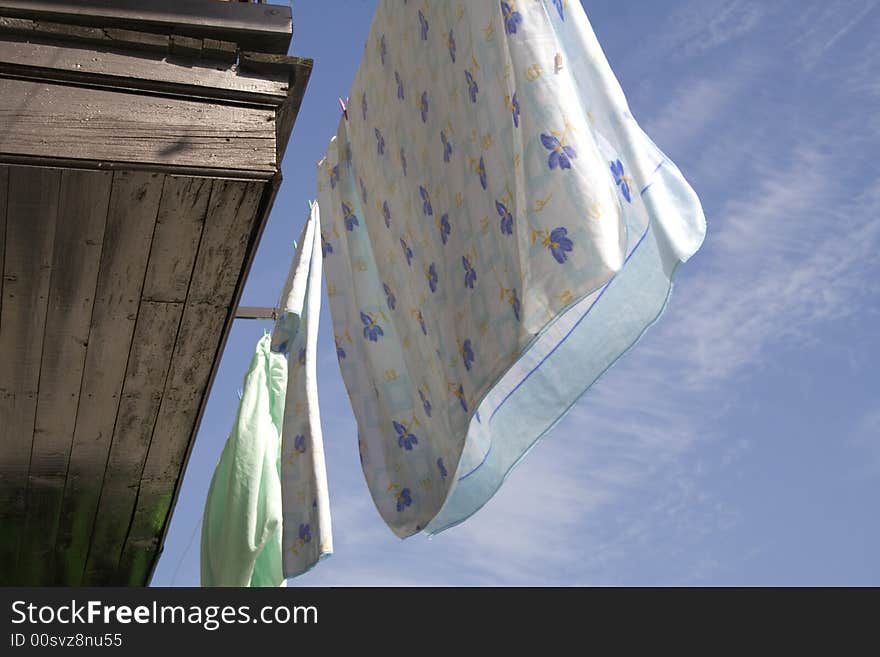 Sheets hanged out from balcony