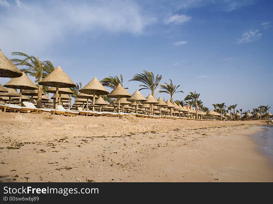 Egyptian Beach awaiting visitors to make use of the sun beds and umbrellas ;-). Egyptian Beach awaiting visitors to make use of the sun beds and umbrellas ;-)