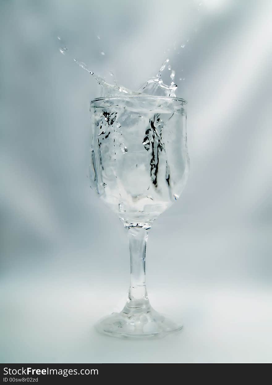 Glass of water on a white background