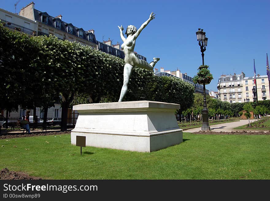 A computer generated statue of a dancing woman inserted in a real photography on a real pedestal. Ideal for illustrating freedom or the act of dancing. A computer generated statue of a dancing woman inserted in a real photography on a real pedestal. Ideal for illustrating freedom or the act of dancing.