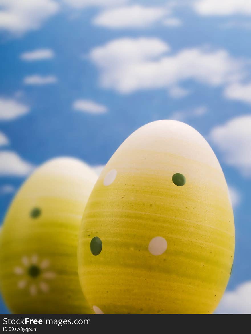 Easter eggs over a blue sky