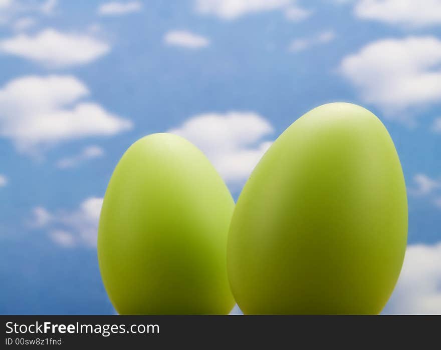 Easter eggs over a blue sky