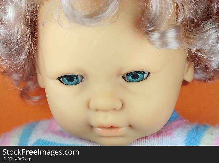 Plastic doll with blue eyes