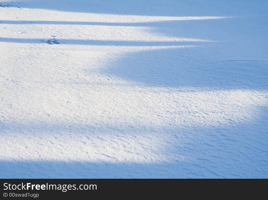 Texture of light and shade on snow. Texture of light and shade on snow